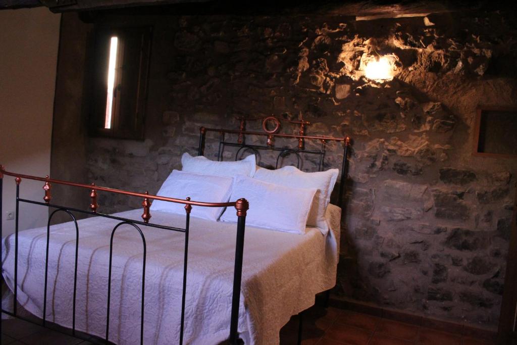 Postel nebo postele na pokoji v ubytování Casa Rural Majico