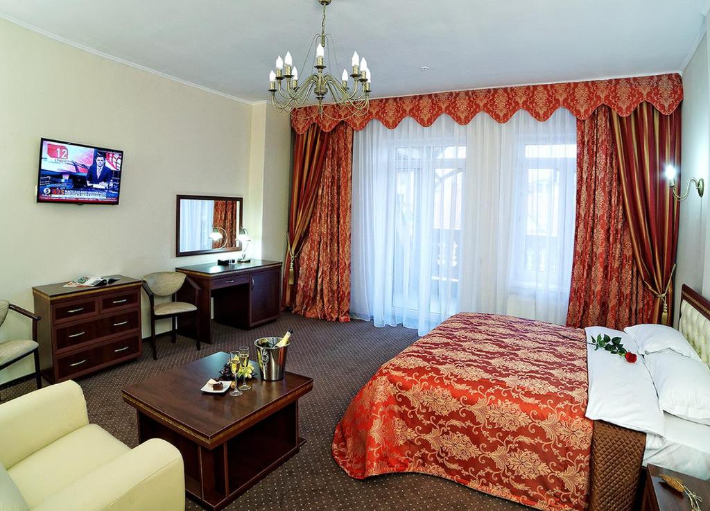 Postel nebo postele na pokoji v ubytování Svityaz Resort