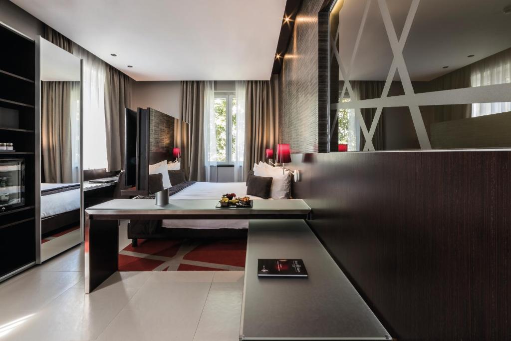 Зона вітальні в Hotel Manin