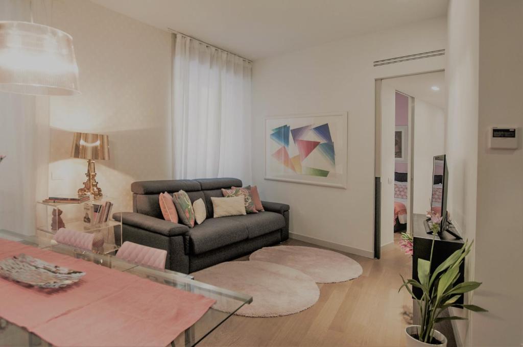 A seating area at Madeleine apartments - Brera