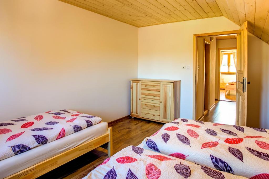 Postel nebo postele na pokoji v ubytování Chata Mária & Apartmány Mária