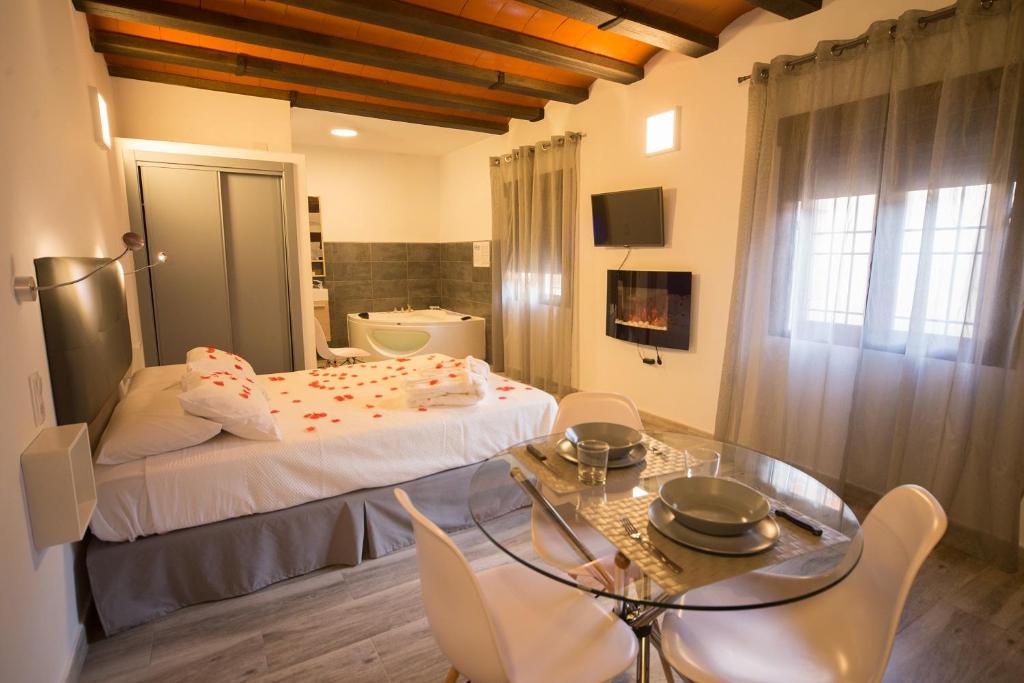 Postel nebo postele na pokoji v ubytování Estudios Rurales La Casa de Luis