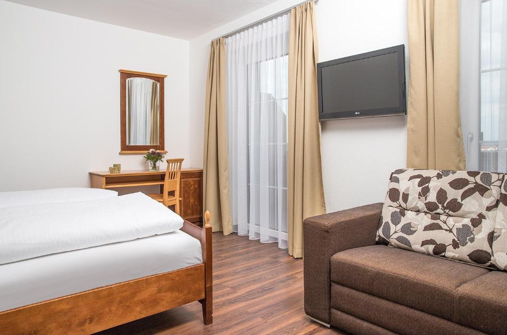 Posteľ alebo postele v izbe v ubytovaní Hotel & Restaurant Rupertigau