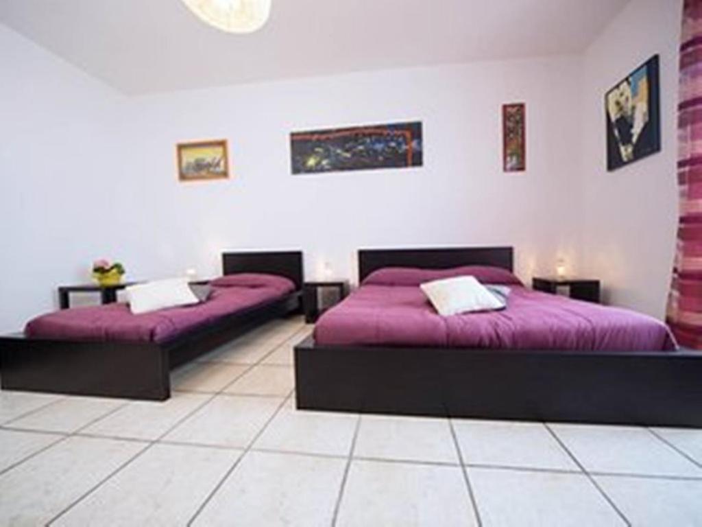 Postel nebo postele na pokoji v ubytování B&B A Casa Di Joy