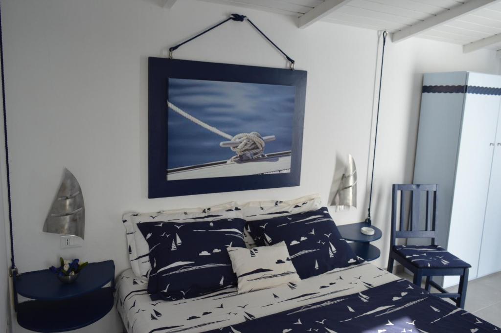 Postel nebo postele na pokoji v ubytování Yacht Club Sal