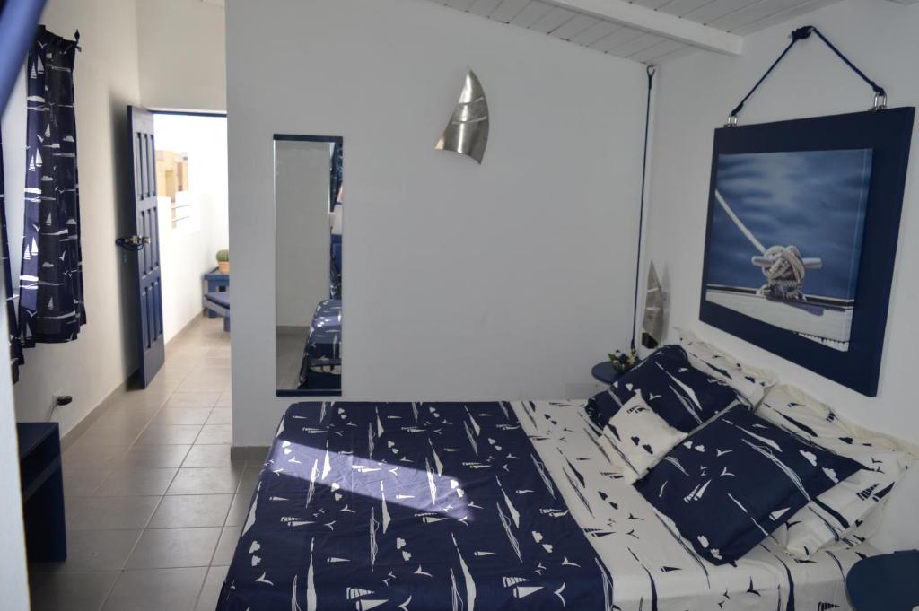 Postel nebo postele na pokoji v ubytování Yacht Club Sal