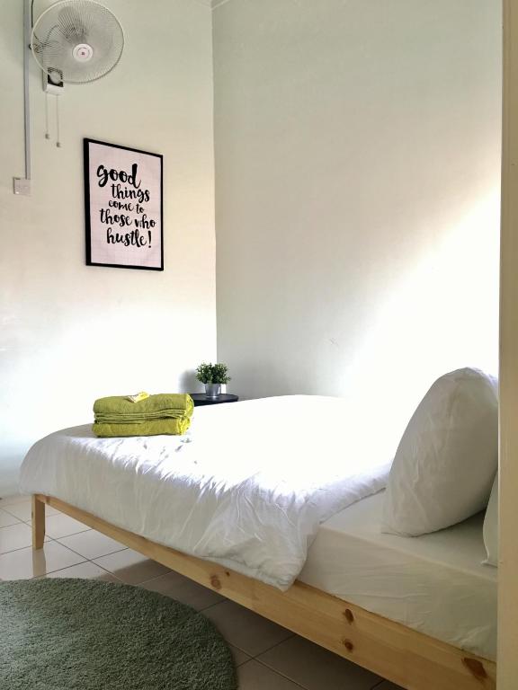 Postel nebo postele na pokoji v ubytování D'Houzz