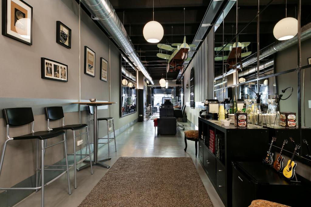 Reštaurácia alebo iné gastronomické zariadenie v ubytovaní Fira Apartments by gaiarooms