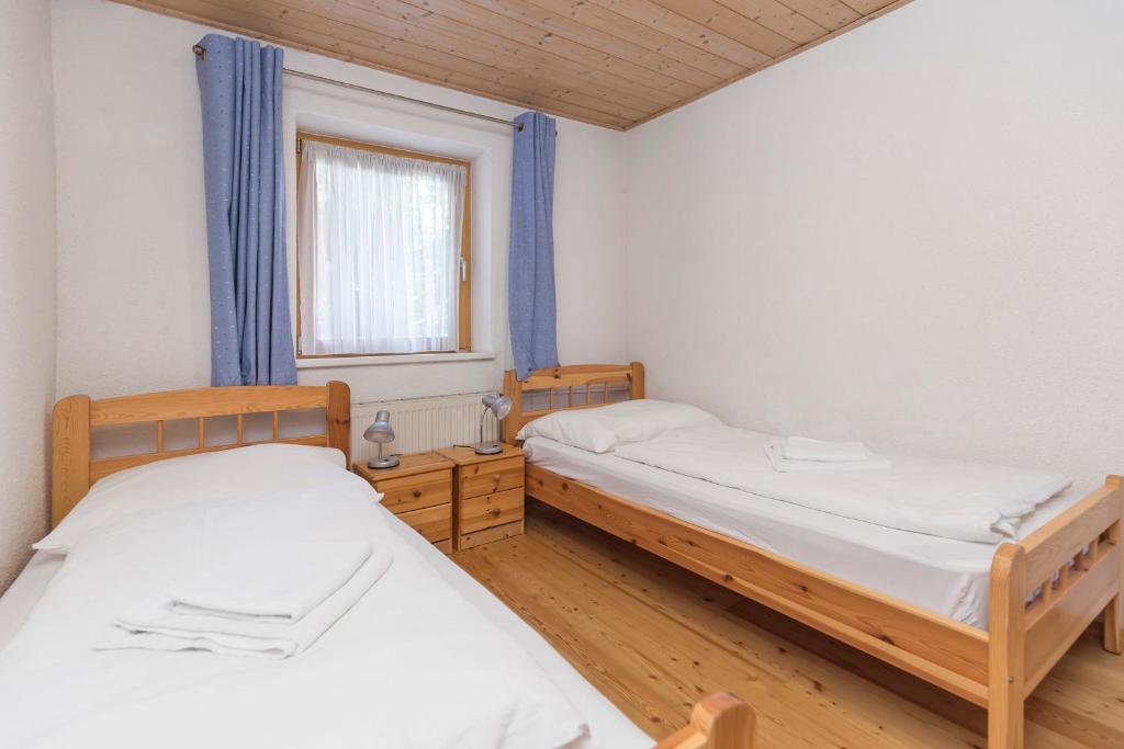 Posteľ alebo postele v izbe v ubytovaní Chalet Struber