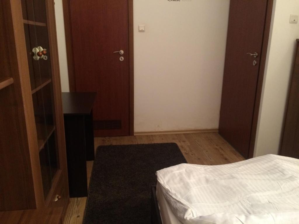 Postel nebo postele na pokoji v ubytování Studio Julius Constanta