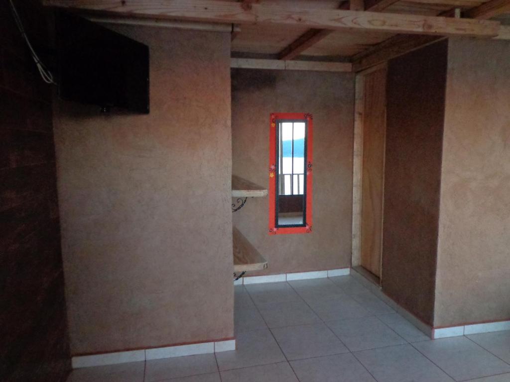 TV a/nebo společenská místnost v ubytování ZIRAHUÉN CUIN Habitaciones Rústicas