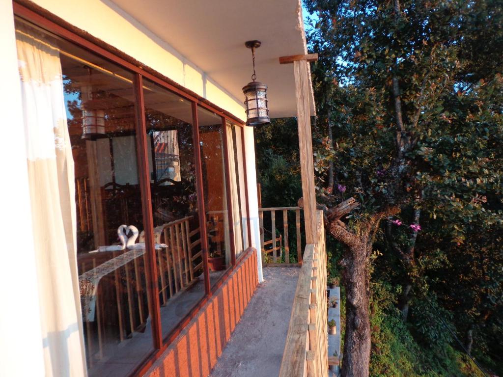 Balkón nebo terasa v ubytování ZIRAHUÉN CUIN Habitaciones Rústicas