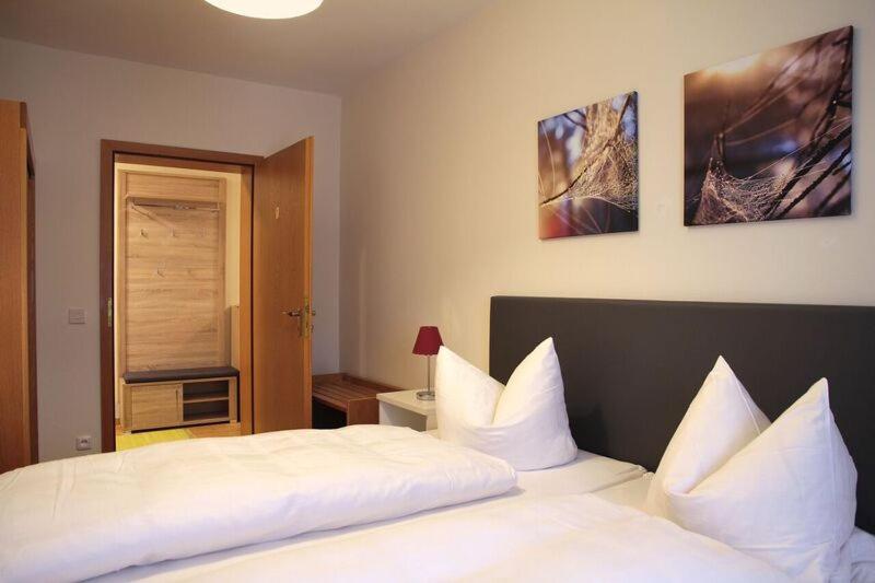 Postel nebo postele na pokoji v ubytování Hotel zur Post