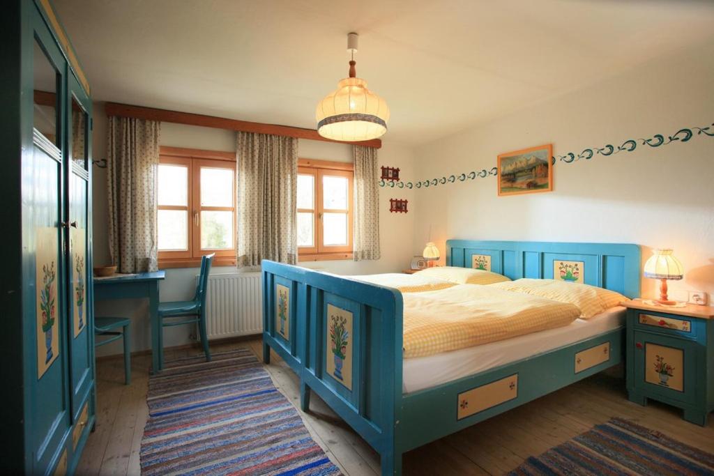 Postel nebo postele na pokoji v ubytování Bergpension Zinting