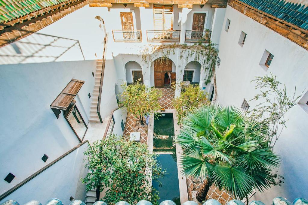 an overhead view of a building with a courtyard at Riad Le Rihani in Marrakech