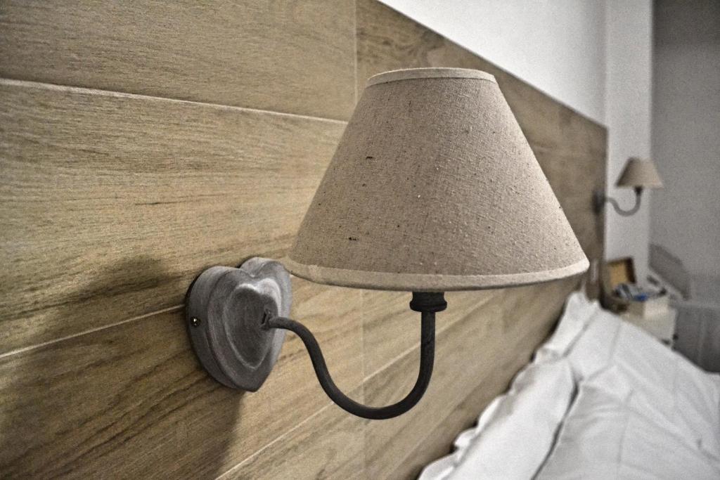 Postel nebo postele na pokoji v ubytování Hotel La Bussola