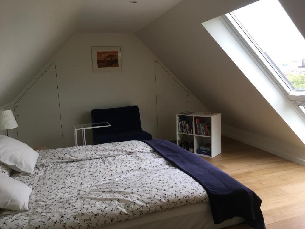 Postel nebo postele na pokoji v ubytování B&B Wannes Suite