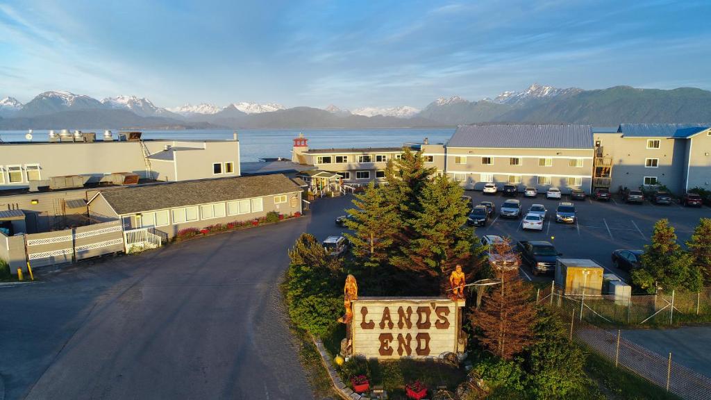 an aerial view of a town with a sign that reads lamps end at Land's End in Homer