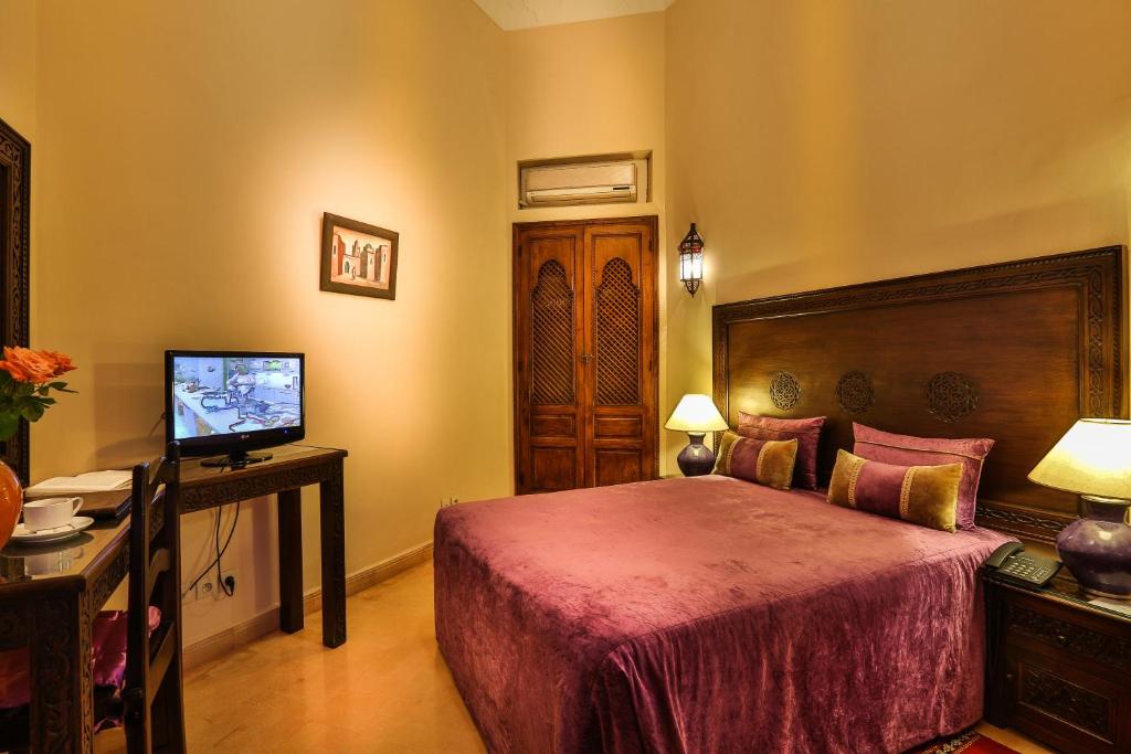 Postel nebo postele na pokoji v ubytování Riad & Spa Bahia Salam