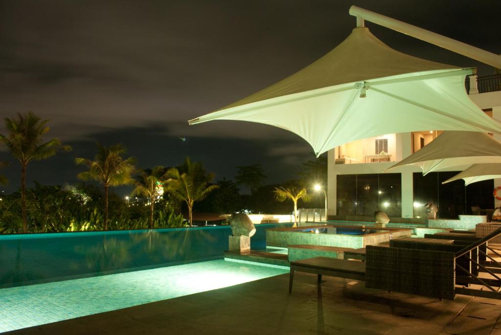 Bazén v ubytování Lombok Astoria Hotel nebo v jeho okolí