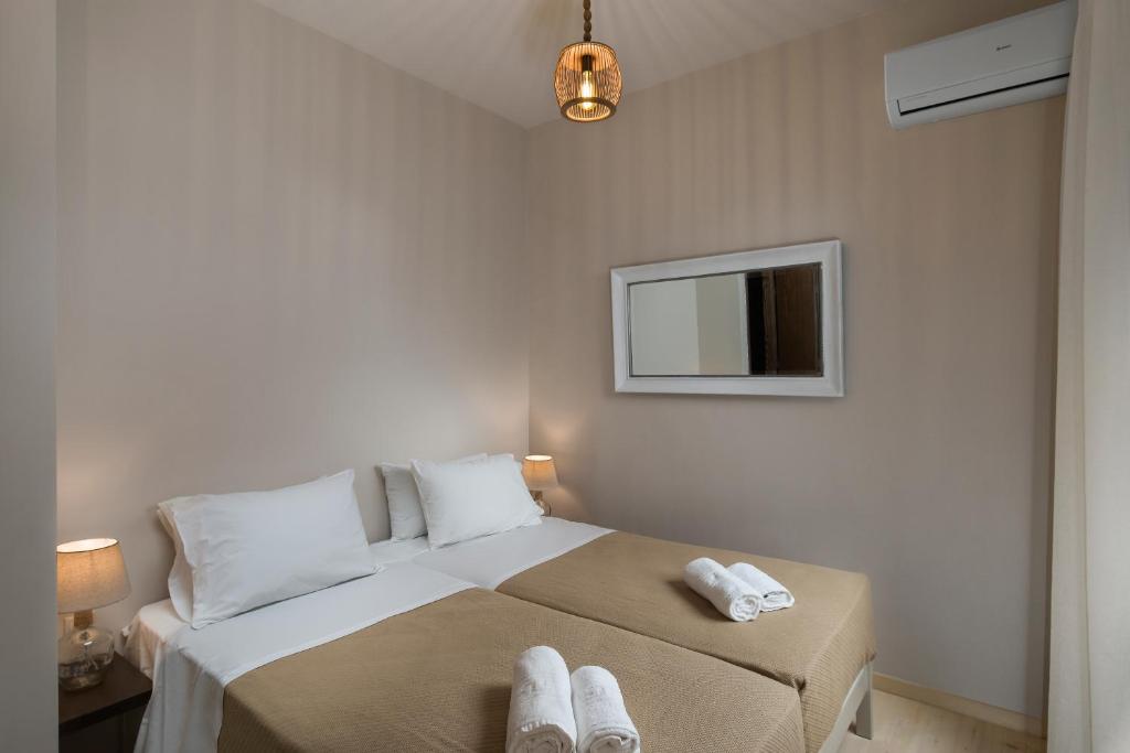 Un ou plusieurs lits dans un hébergement de l'établissement Nonnalena Boutique Hotel