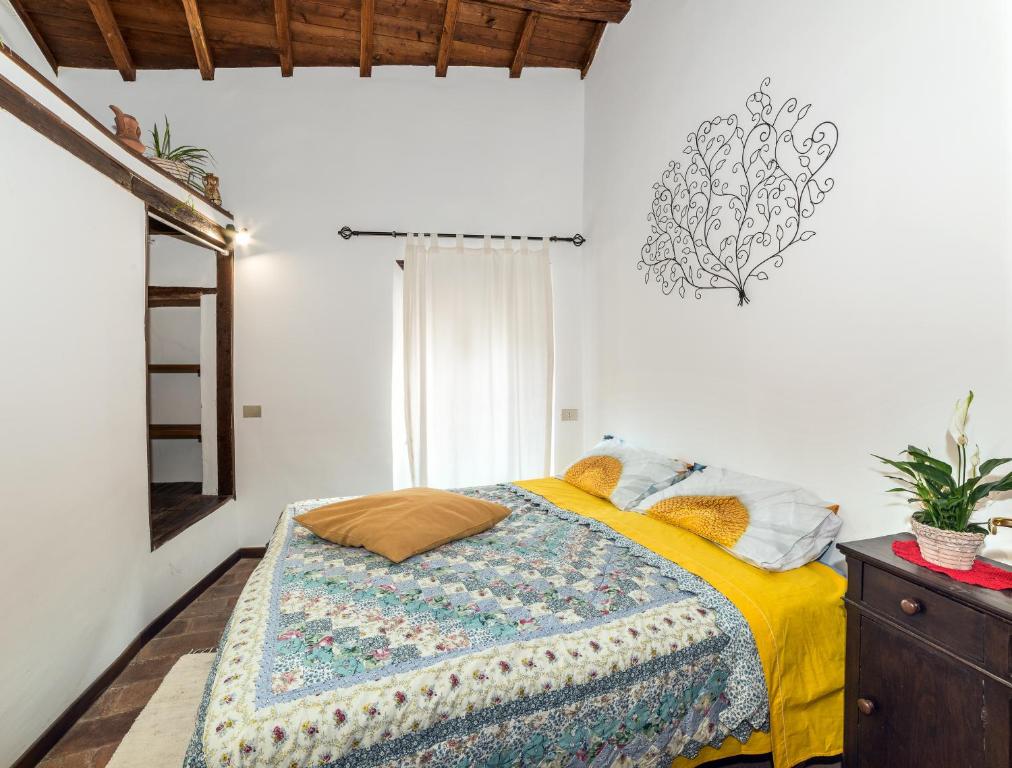 Posteľ alebo postele v izbe v ubytovaní Casa Roma