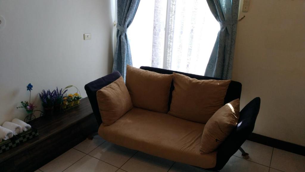 Posezení v ubytování Breadtree Homestay