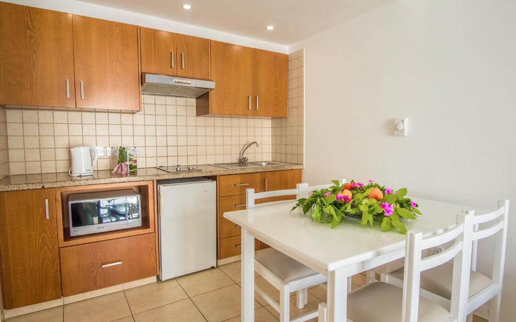 Kuchyň nebo kuchyňský kout v ubytování Alva Hotel Apartments
