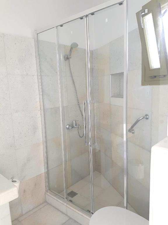 Koupelna v ubytování Artemis Hotel