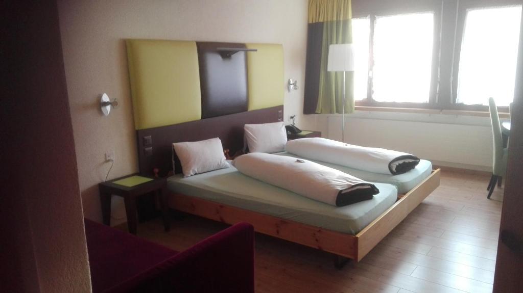 Postel nebo postele na pokoji v ubytování Minster Hotel