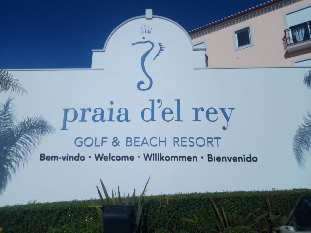 a sign for a golf beach resort at Praia Del Rey Seaview Apartment in Casal da Lagoa Seca