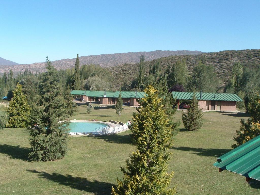 
A view of the pool at Cabañas Andinas or nearby
