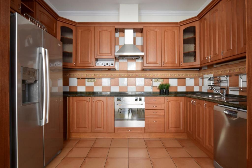 Kuchyňa alebo kuchynka v ubytovaní Standerd Apartment by Hi5 - Lovag Family Suites