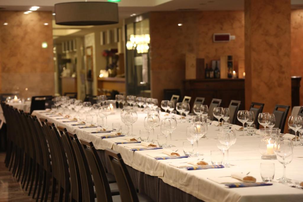 Reštaurácia alebo iné gastronomické zariadenie v ubytovaní Hotel San Martino