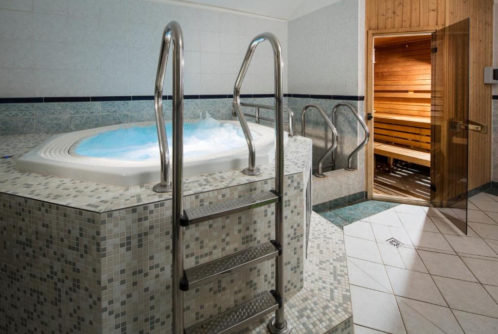 Letto o letti in una camera di Spa Resort Libverda - Hotel Nový Dům
