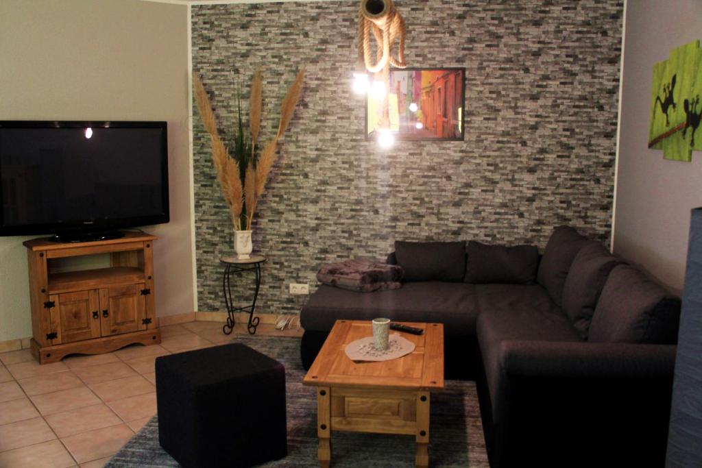 TV a/nebo společenská místnost v ubytování Ferienwohnung "Gecko"