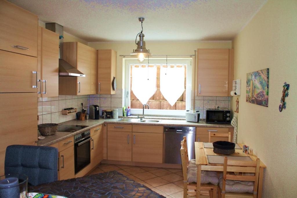 Kuchyň nebo kuchyňský kout v ubytování Ferienwohnung "Gecko"