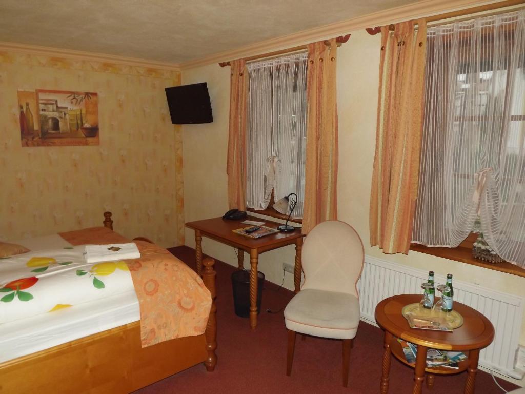 Voodi või voodid majutusasutuse Hotel Piccolo toas