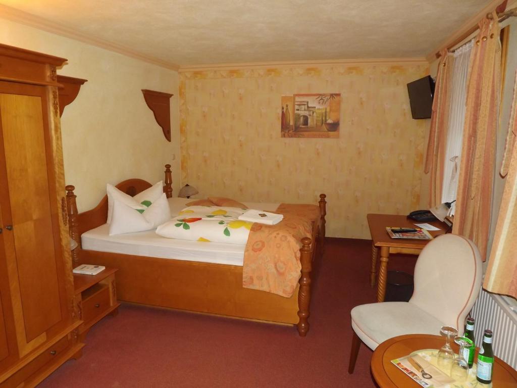 Voodi või voodid majutusasutuse Hotel Piccolo toas