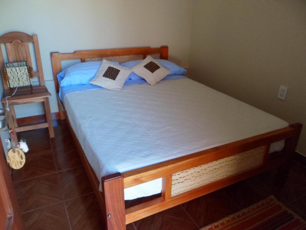Postel nebo postele na pokoji v ubytování El Cardon Hospedaje