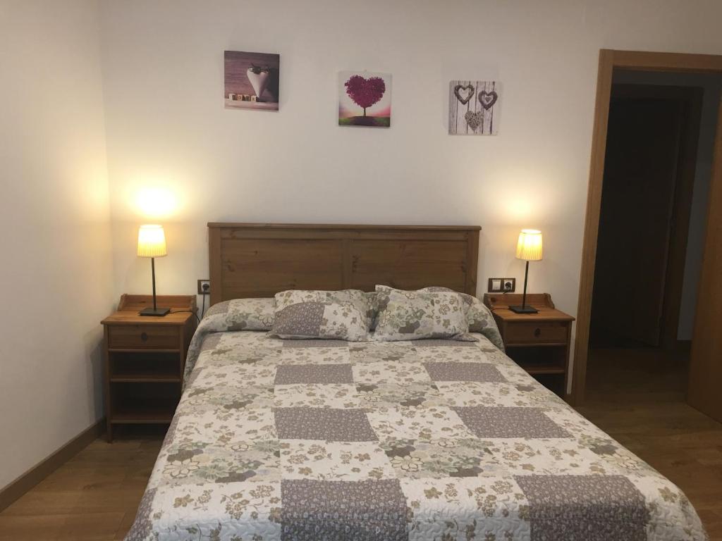 Postel nebo postele na pokoji v ubytování Precioso apartamento con vistas montaña o rio