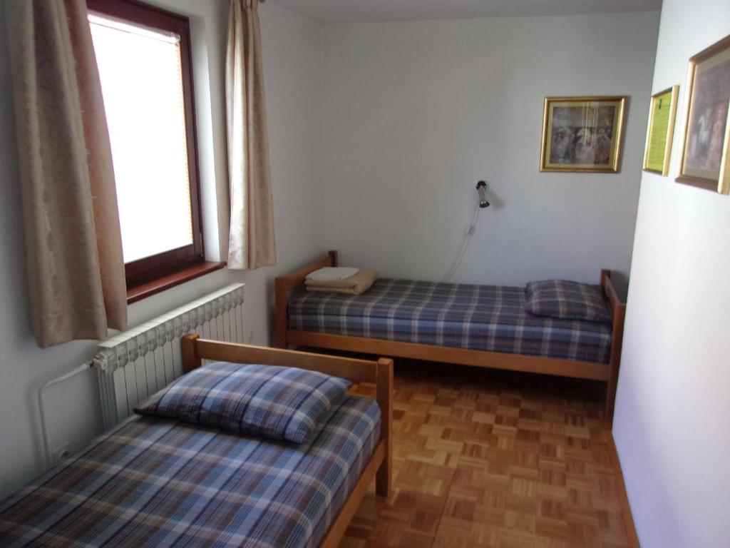 Postel nebo postele na pokoji v ubytování Tower House