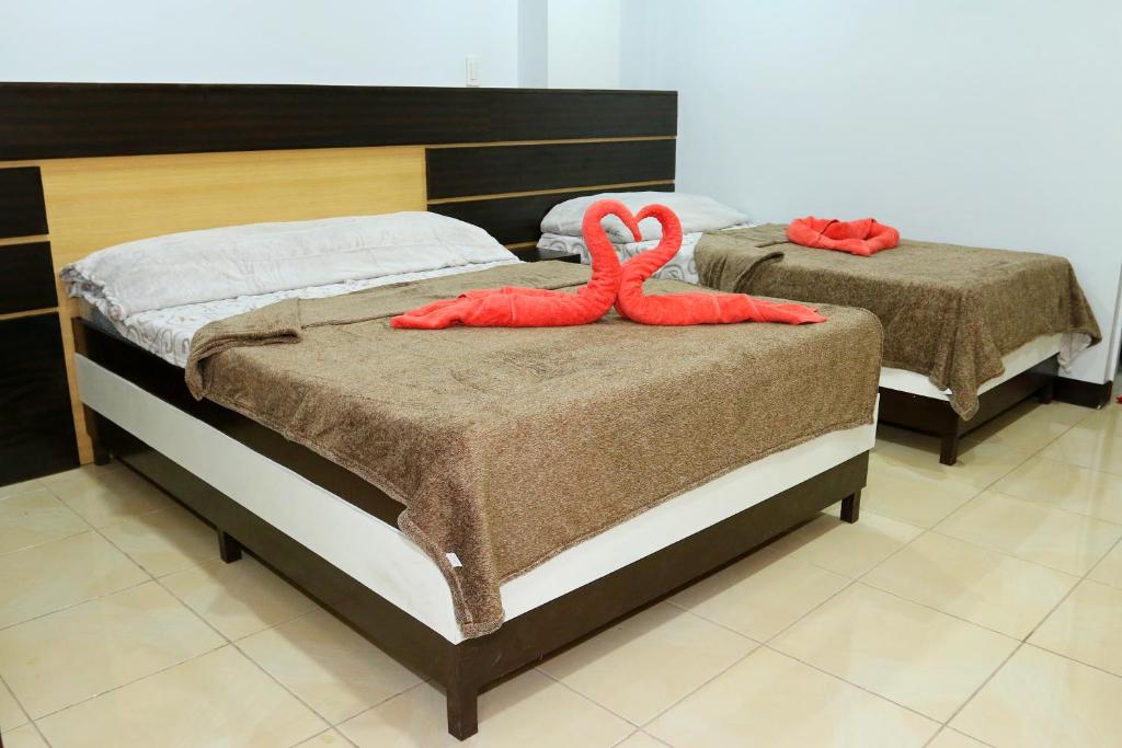 Postel nebo postele na pokoji v ubytování Global 88 Apartelle