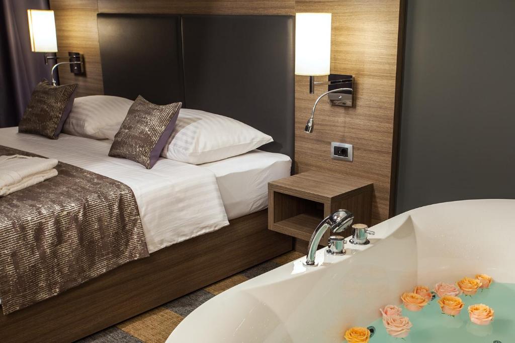 Postel nebo postele na pokoji v ubytování Hotel Princess