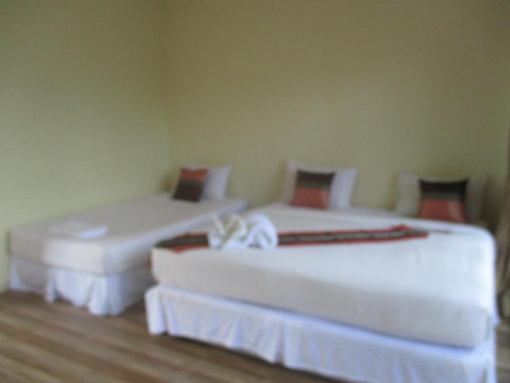 Voodi või voodid majutusasutuse Phi Phi Green House & Sunsky Hostel toas