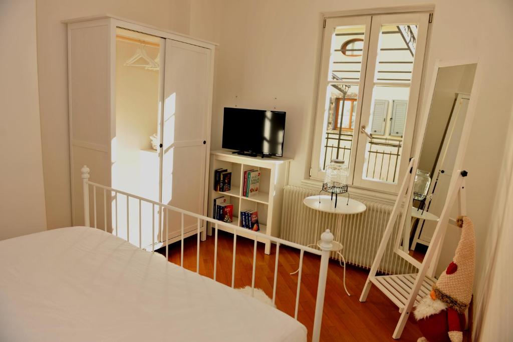 TV o dispositivi per l'intrattenimento presso B&B and Apartments Al Duomo