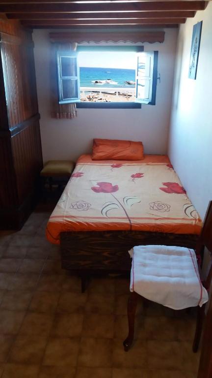 Postel nebo postele na pokoji v ubytování Stegnailion