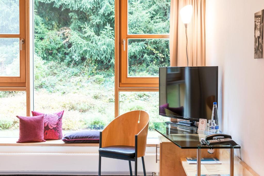 TV a/nebo společenská místnost v ubytování Hotel Kongressissimo