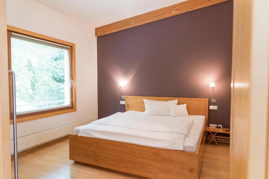Postel nebo postele na pokoji v ubytování Hotel Kongressissimo