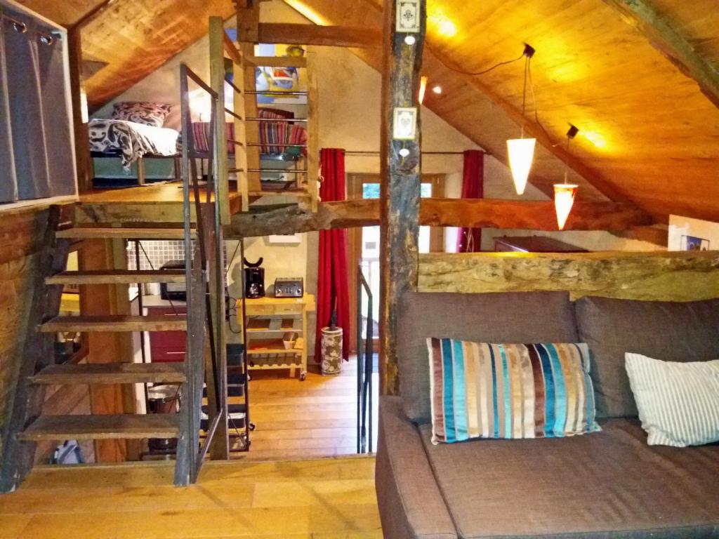 a room with a bunk bed and a staircase at La Maison du Haut Plessix in Clayes